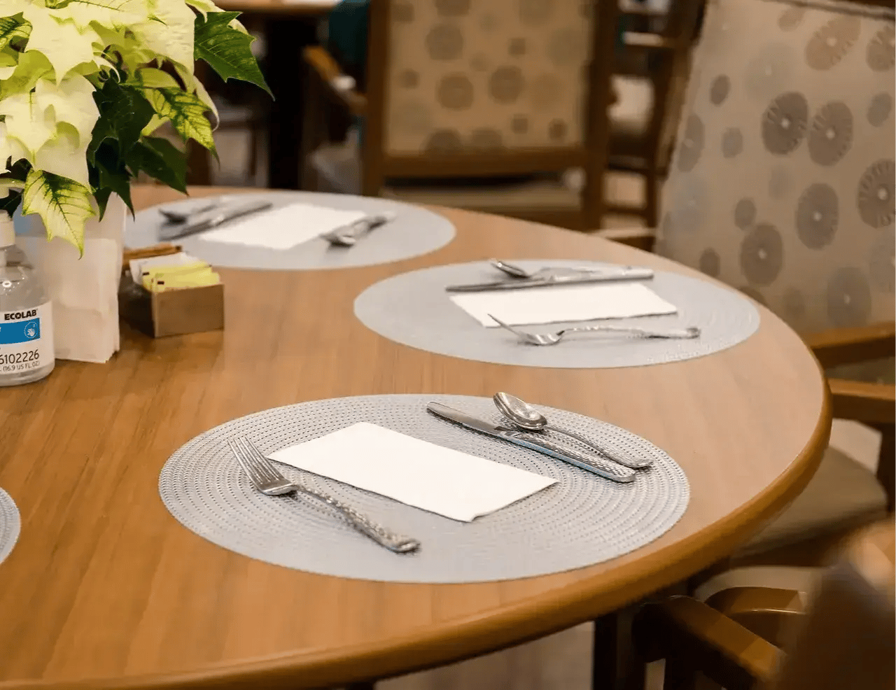 Place settings around a round dining table