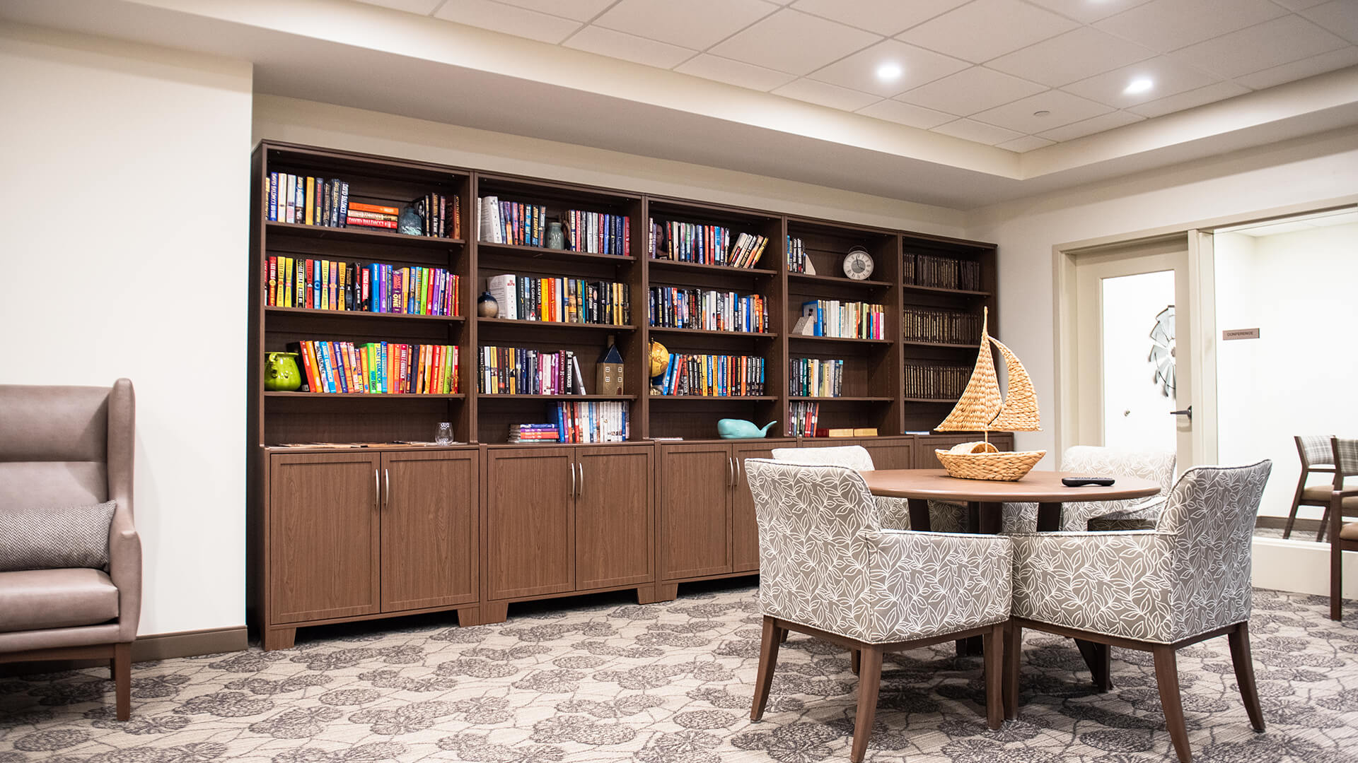 TLC Library with a round table and chairs